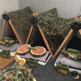 army tents and ammo boxes
